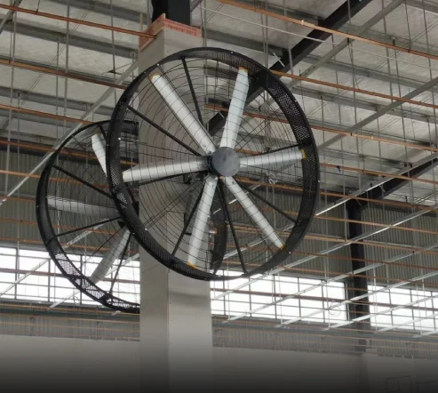 Industrial wall fans mounted on a pillar in a warehouse facility